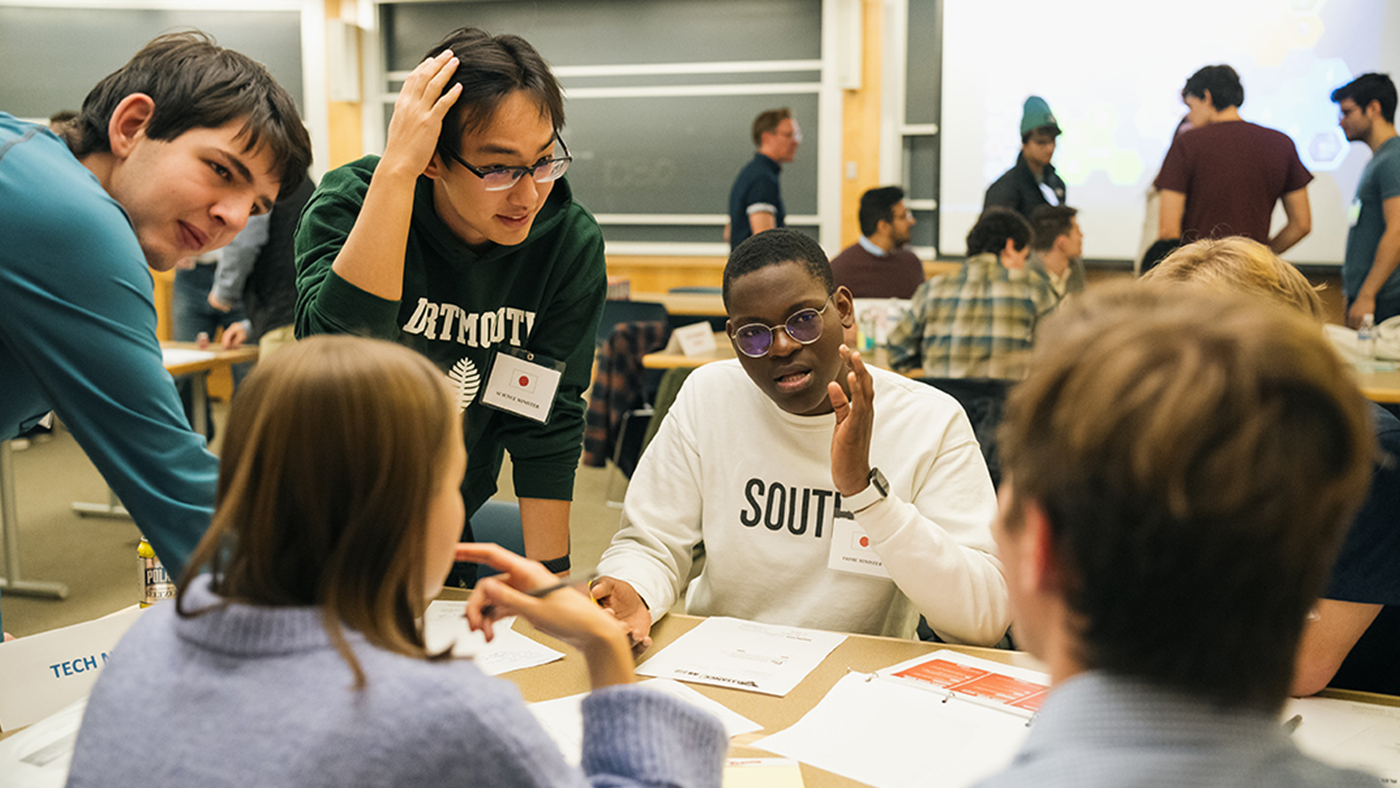 Dartmouth college students roleplaying as world leaders and negotiating an international peace deal.