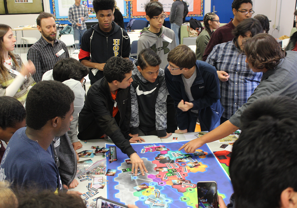 Students discussing strategy